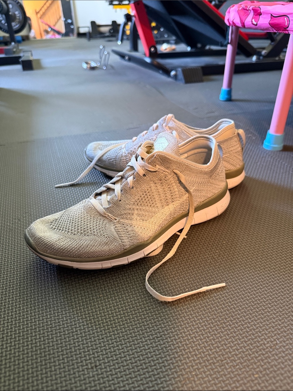 Nike Women's Flyknit Sneakers in Light Olive and White